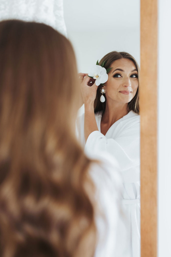 bride getting ready for maui elopement ceremony