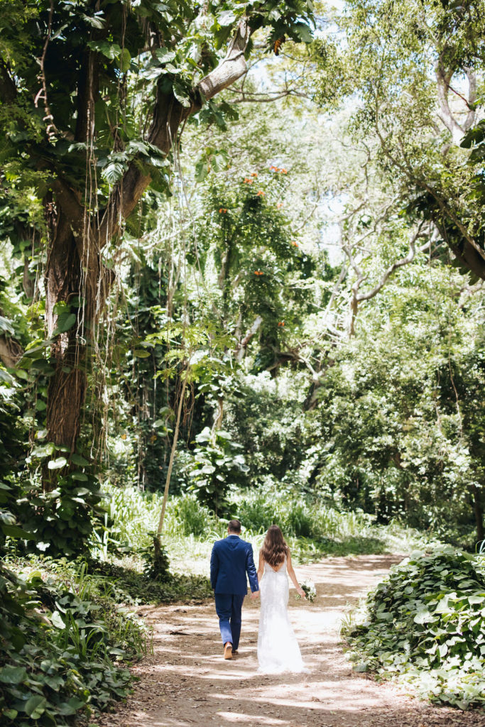 bride and groom in hawaii rain forest