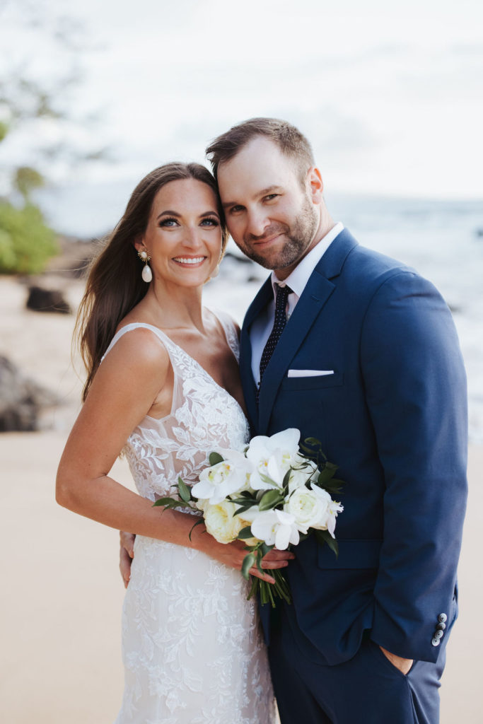 bride and groom portraits on beach in hawaii