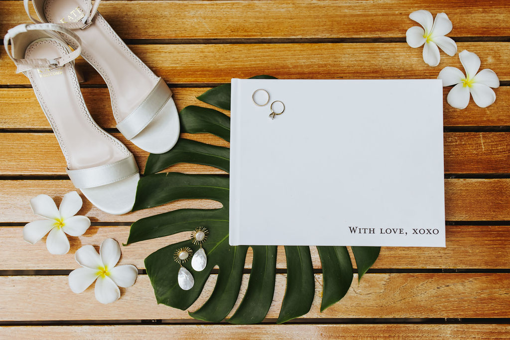 maui wedding stationary with bridal shoes and jewelry