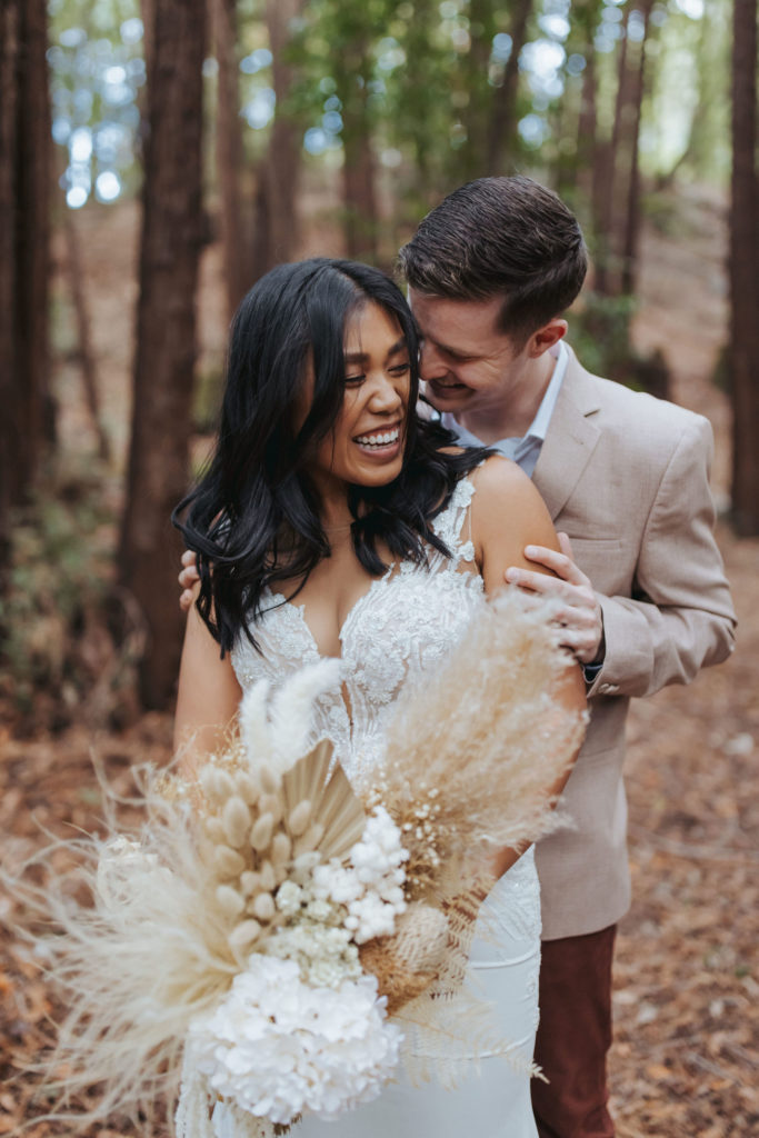bride and groom portraits with pampas grass bouquet