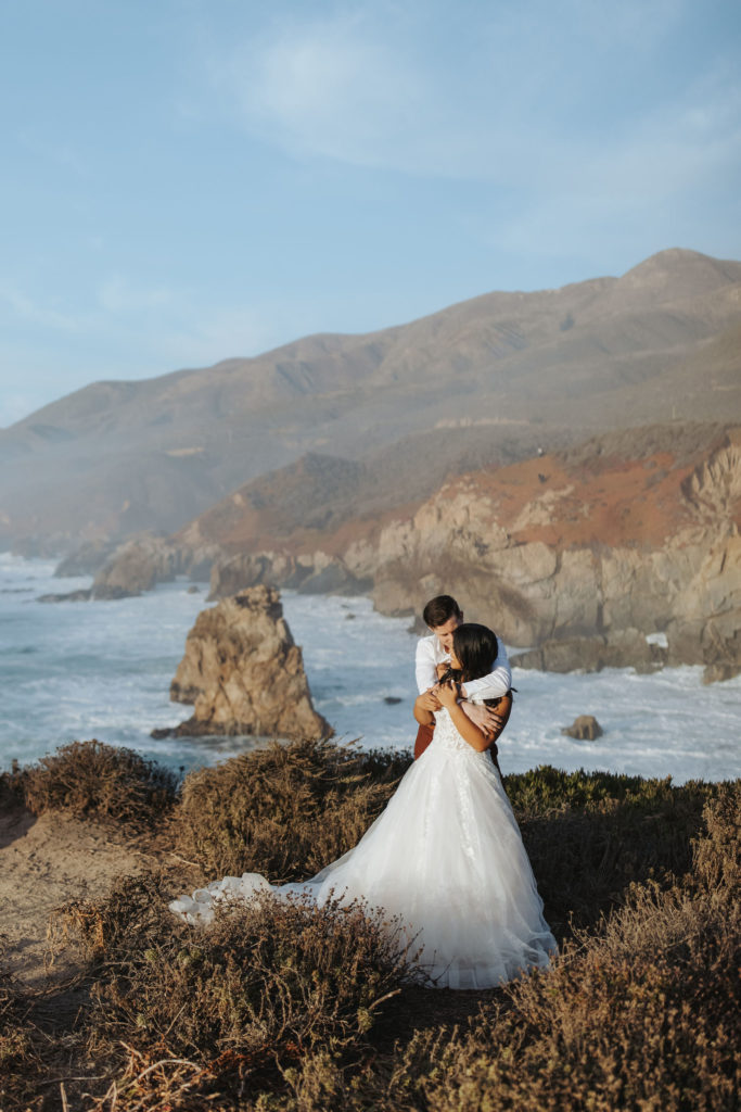 bride and groom portraits on coast in big sur
