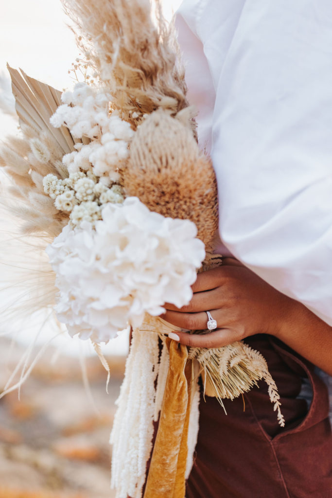 big sur elopement bouquet with white flowers and pampas grass