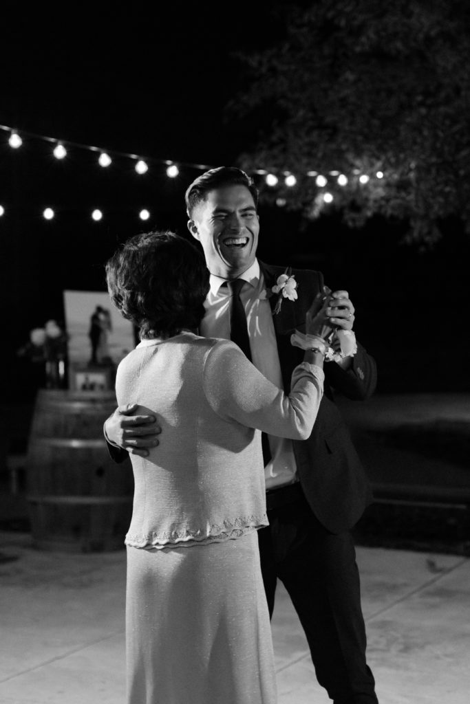 groom and mother dancing at temecula wedding reception