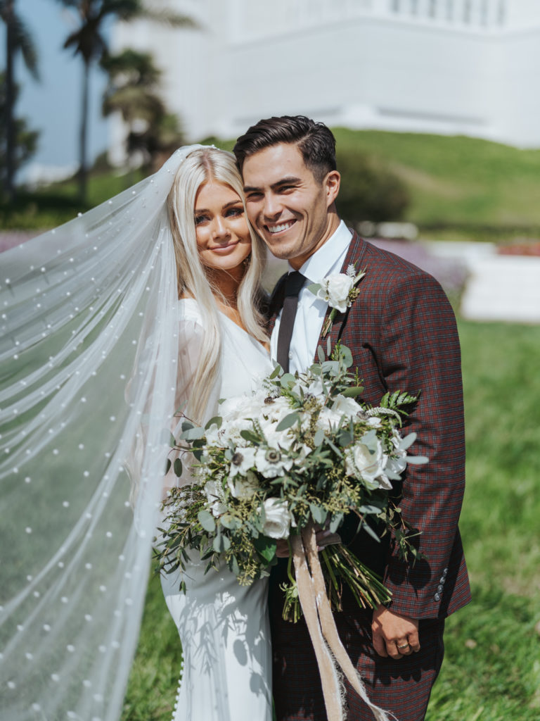 bride and groom at san diego temple wedding