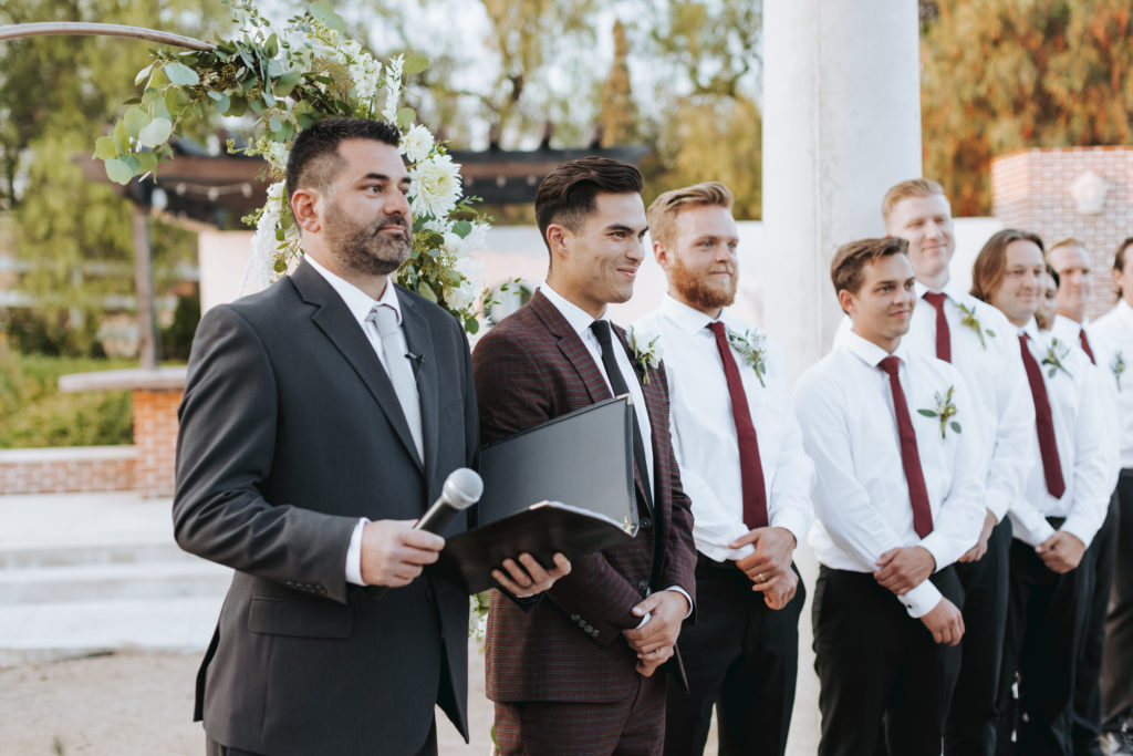 groom waiting on bride with officiant in temecula wedding ceremony