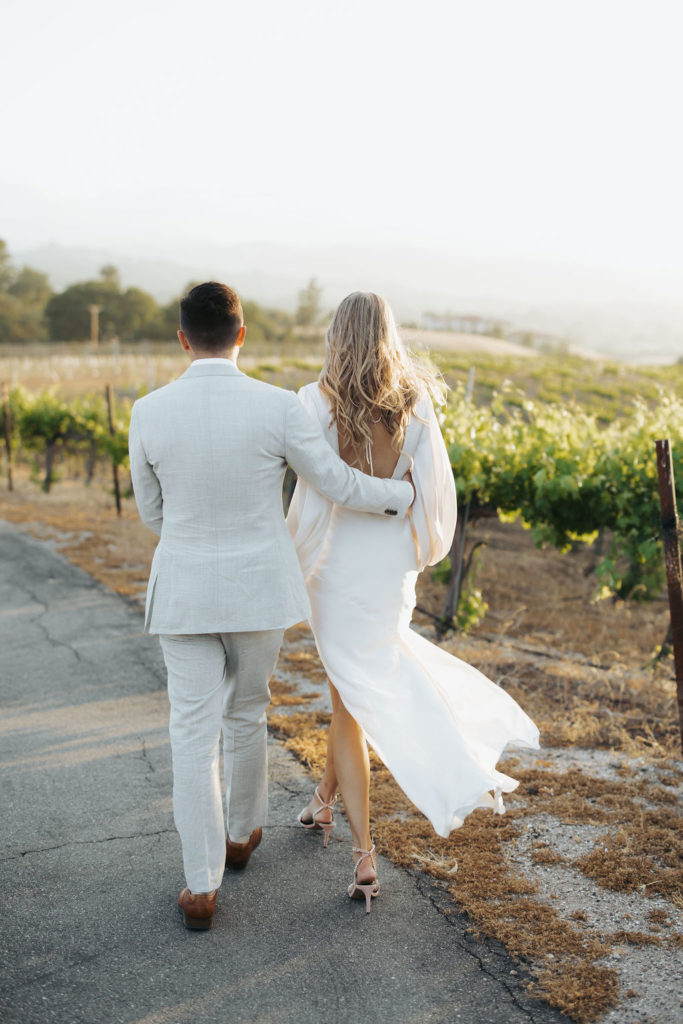 bride and groom portraits in california vineyard