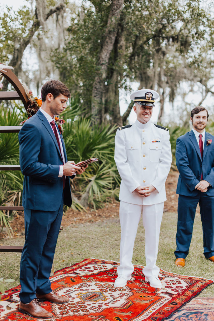 groom and officiant waiting on bride in florida wedding