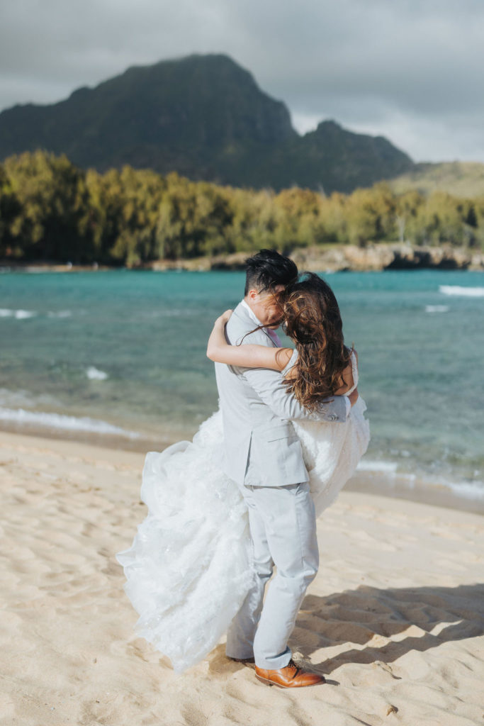 bride and groom beach portraits in kauai hawaii