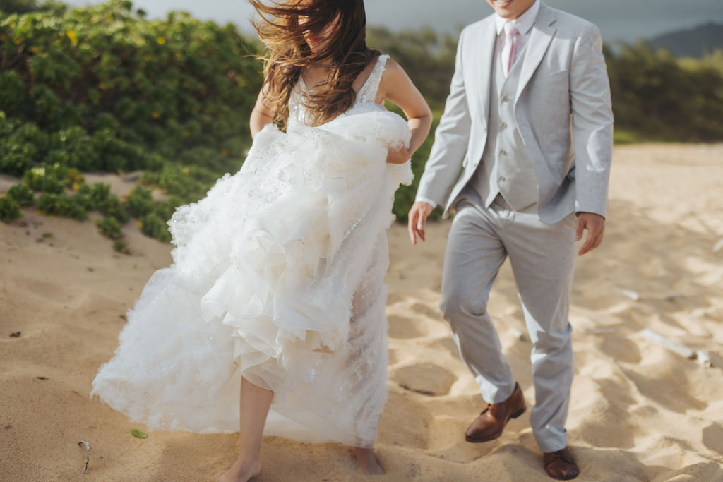 bride and groom beach portraits in kauai hawaii