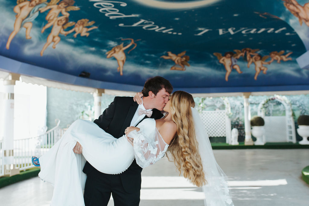 bride and groom at little white wedding chapel in las vegas