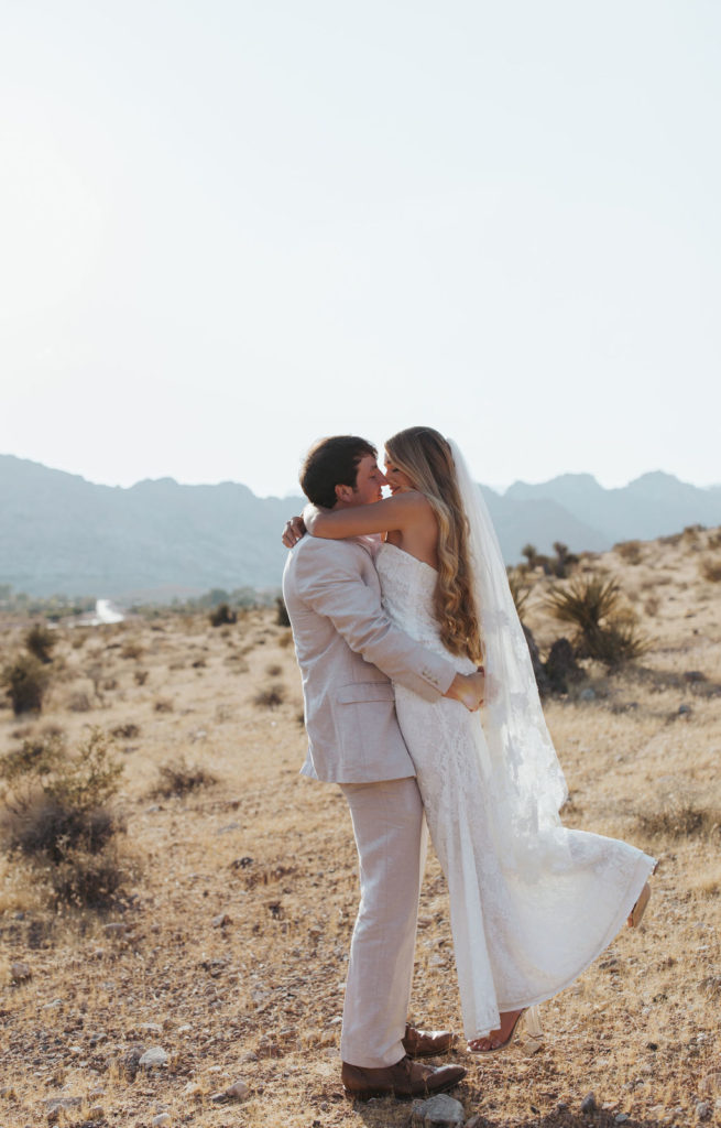 bride and groom portraits in las vegas desert