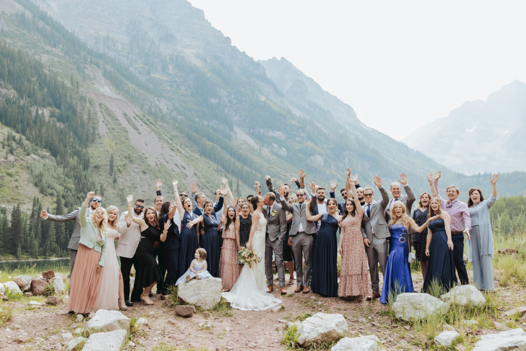 wedding guests with bride and groom at maroon bells wedding ceremony