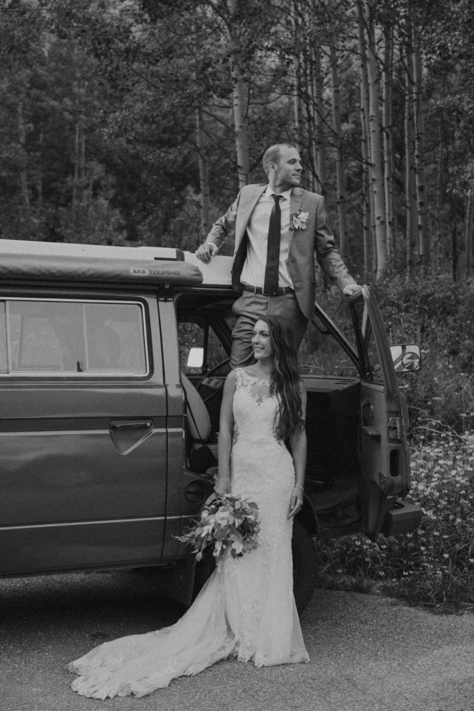 bride and groom portraits in adventure van in maroon bells colorado