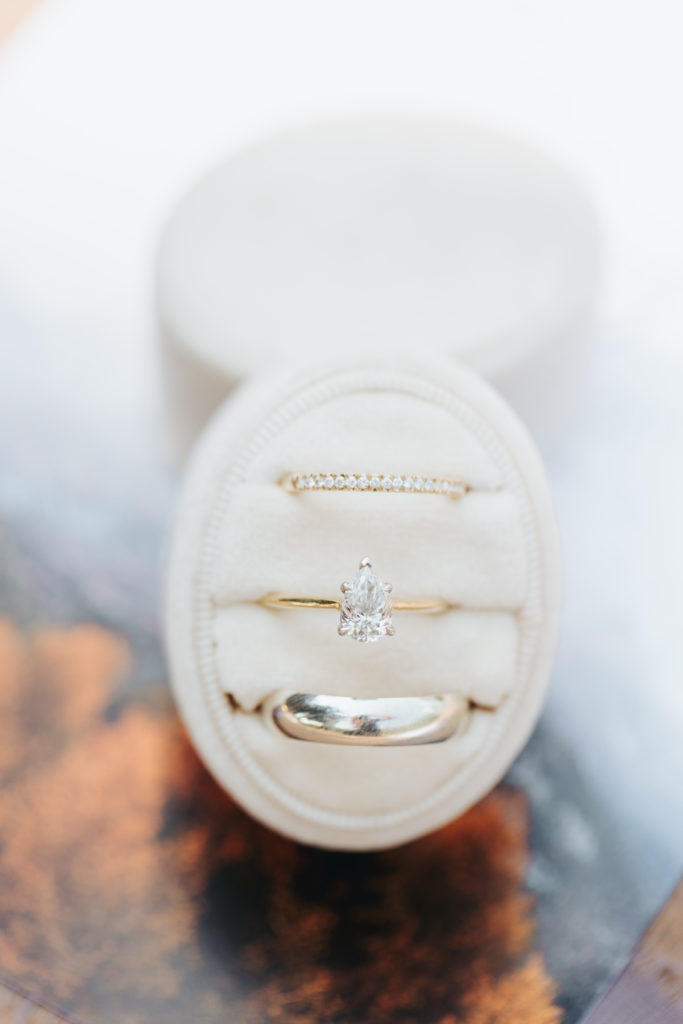 wedding rings in white velvet ring box