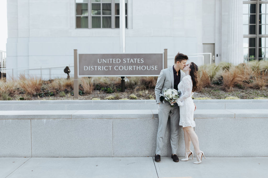 bride and groom in downtown mobile elopement