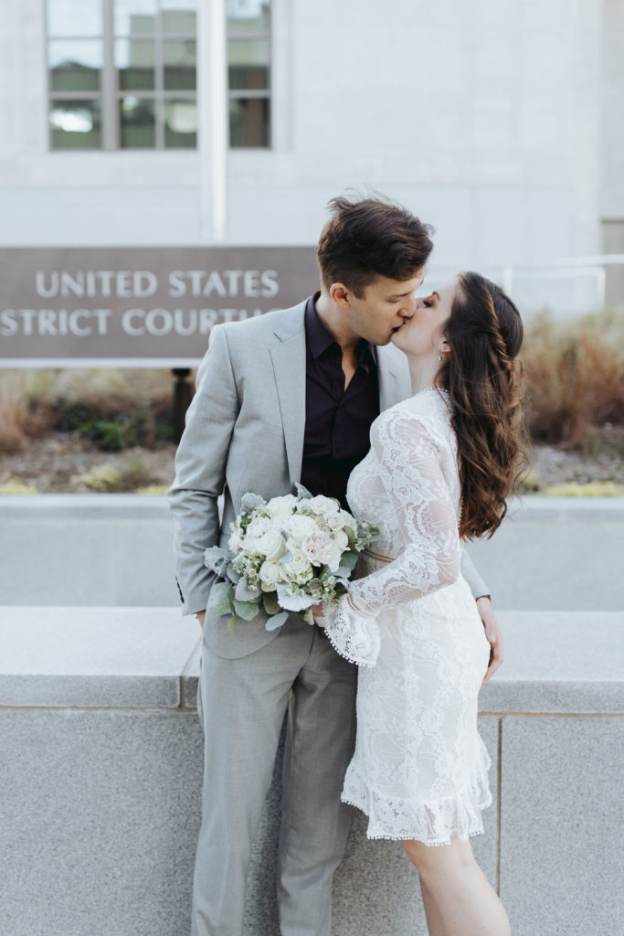 bride and groom in downtown mobile elopement