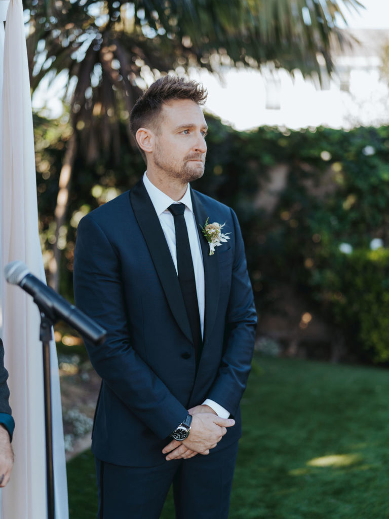 groom waiting for bride during wedding ceremony
