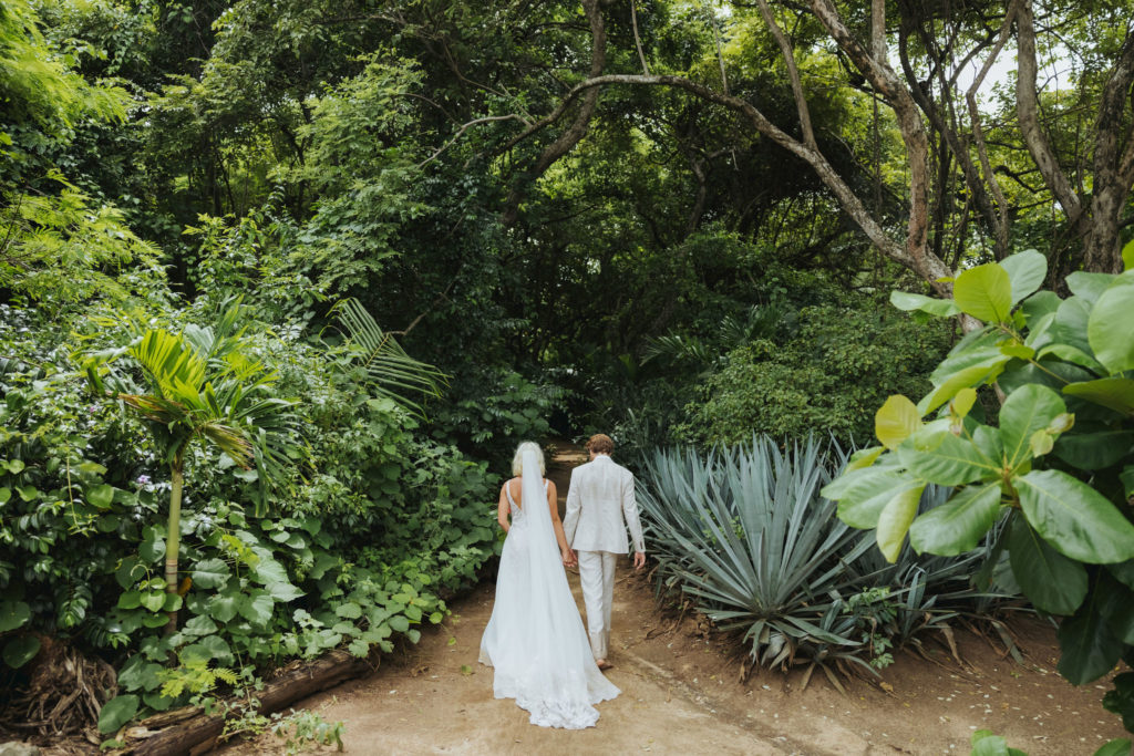 bride and groom portraits in rain forest in costa rica