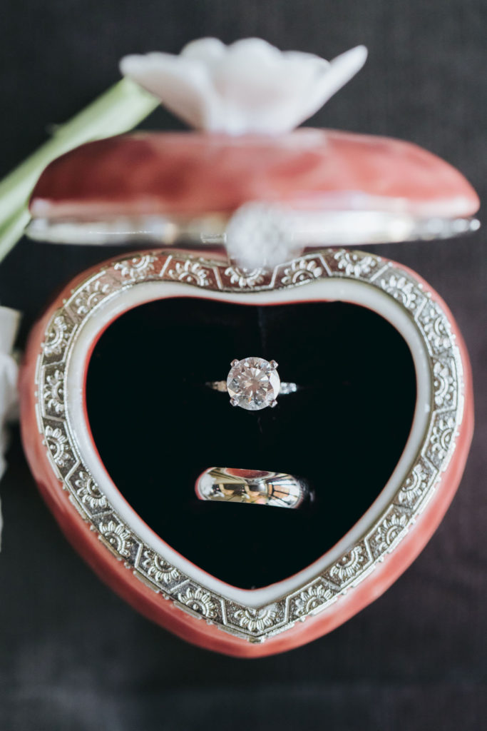 wedding rings in pink velvet heart shaped ring box