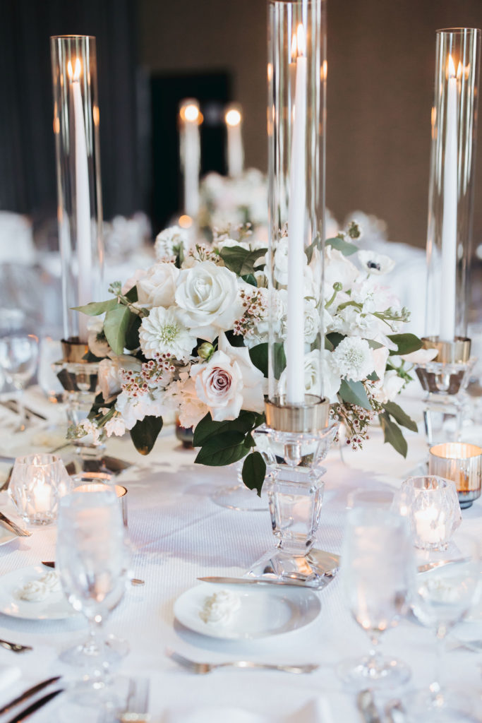 the geraghty luxury wedding reception tables with white flowers and candles