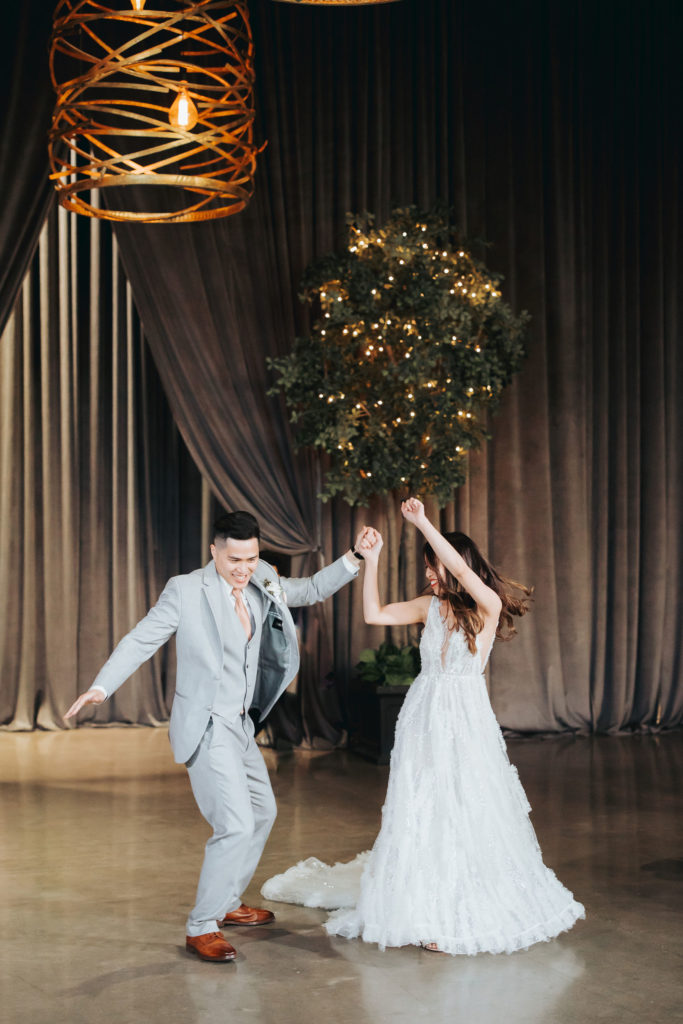 bride and groom dancing at geraghty wedding reception