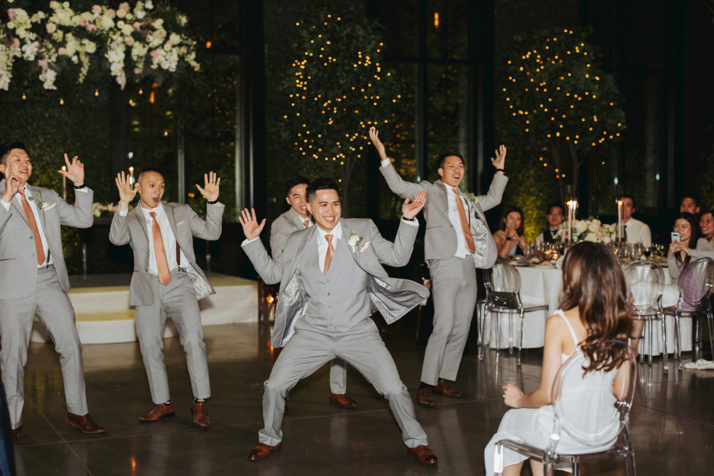 groomsmen dancing for bride at geraghty wedding reception