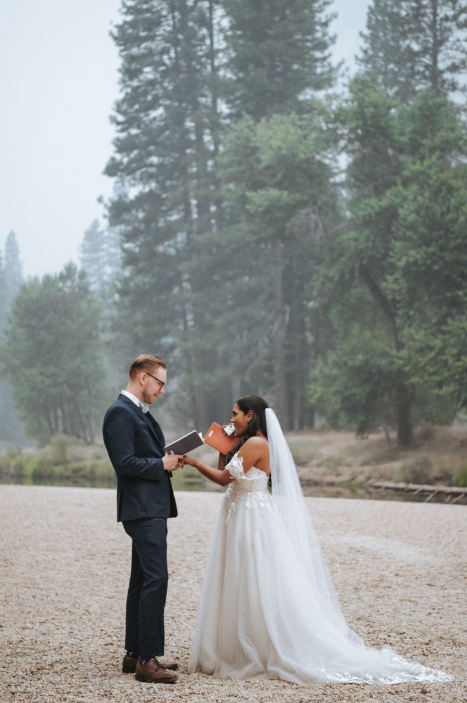 bride and groom exchanging vows in yosemite