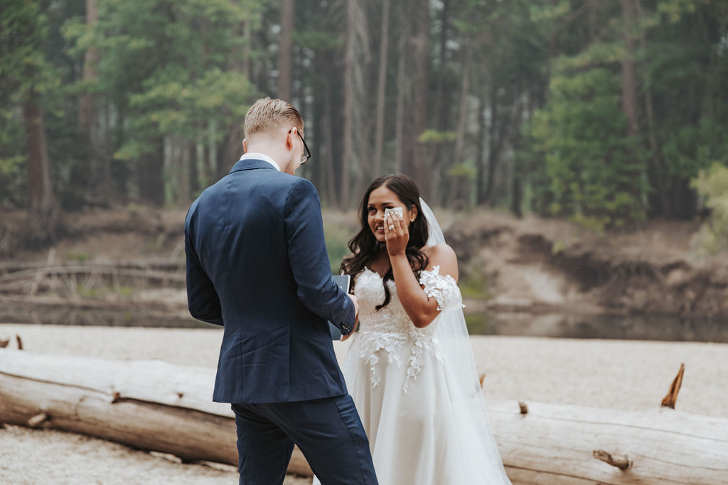 bride and groom exchanging vows in yosemite elopement