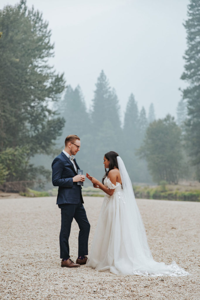 bride and groom exchanging vows in yosemite elopement