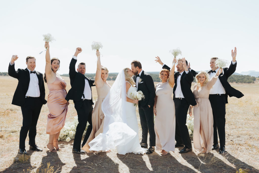 bride and groom with wedding party