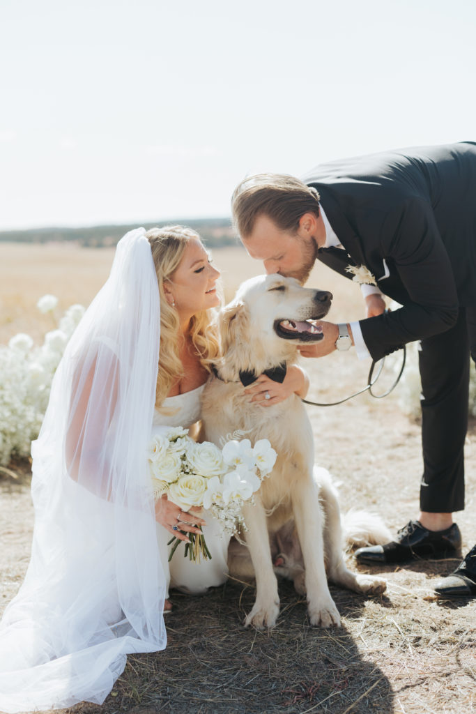 bride and groom with dog in zion national park