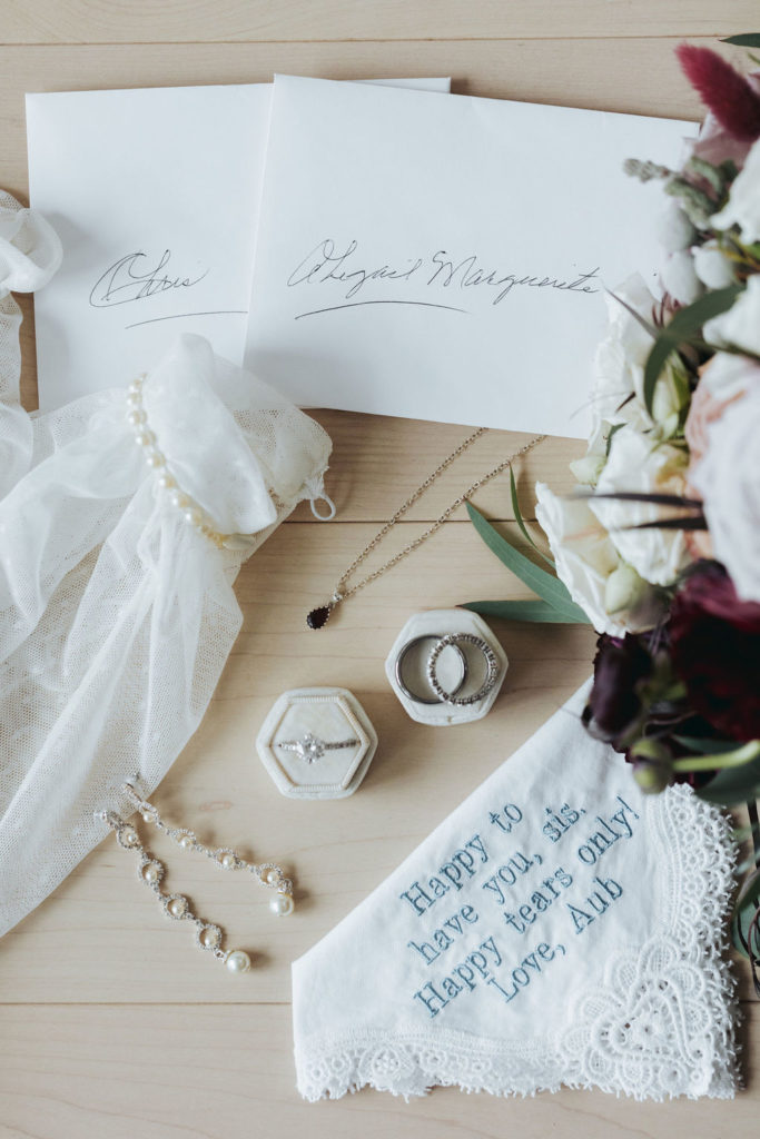 bridal accessories with rings and wedding vows