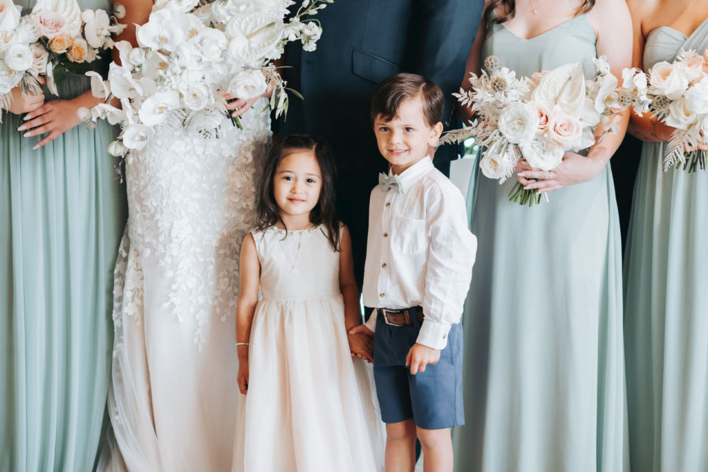 ring bearer and flower girl with bridal party