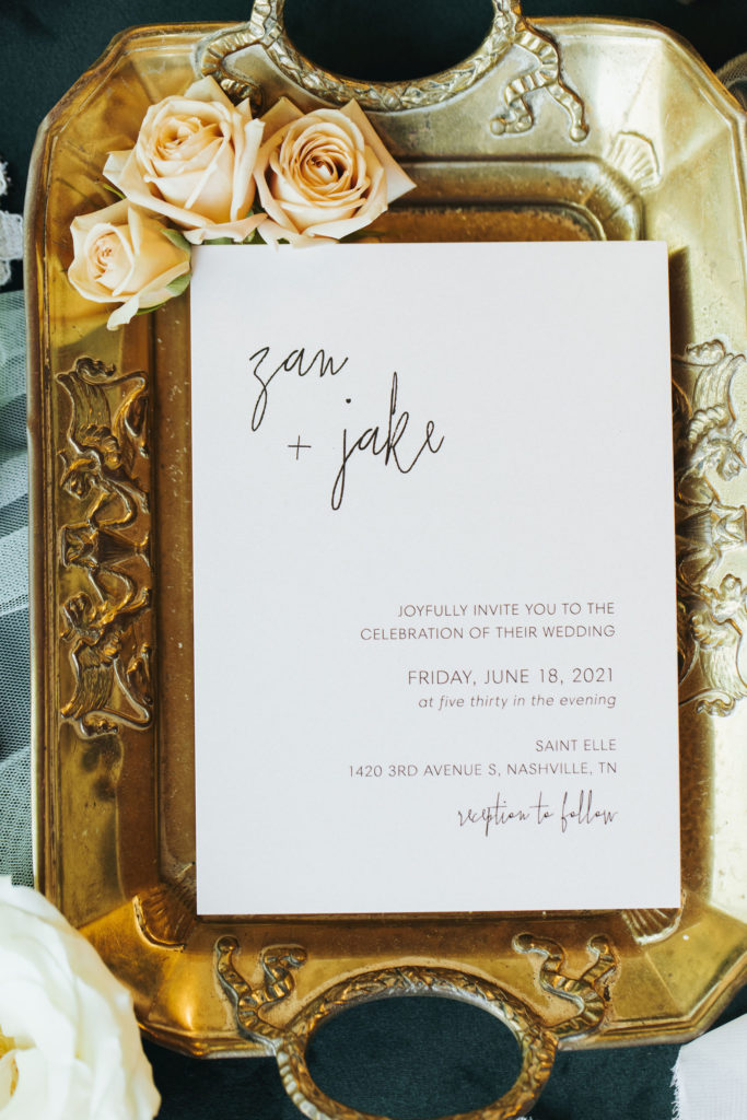 nashville wedding invitation in gold tray