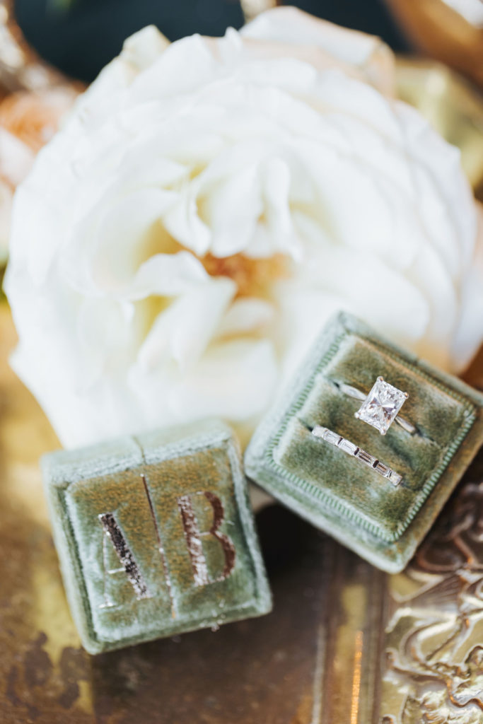 wedding rings in green velvet box