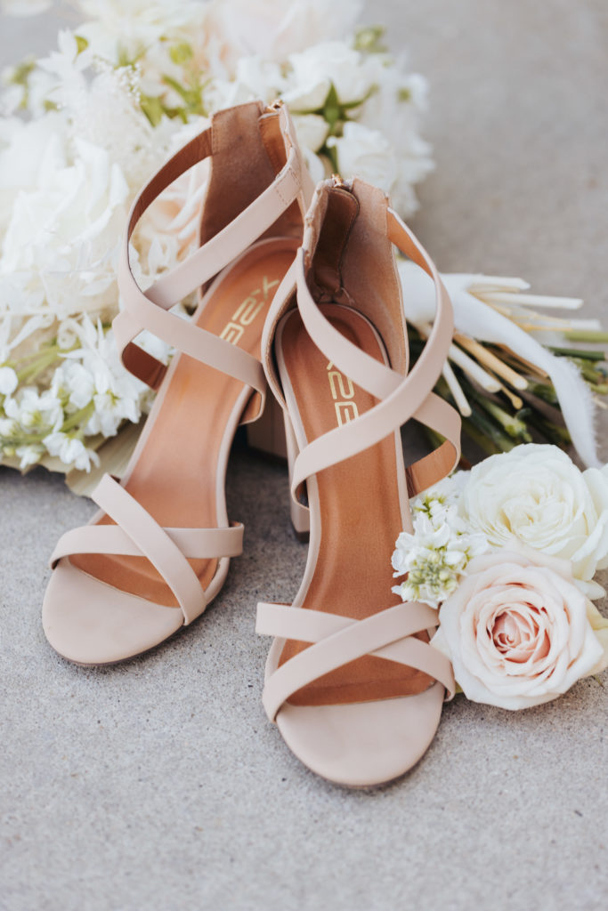 wedding shoes with white roses