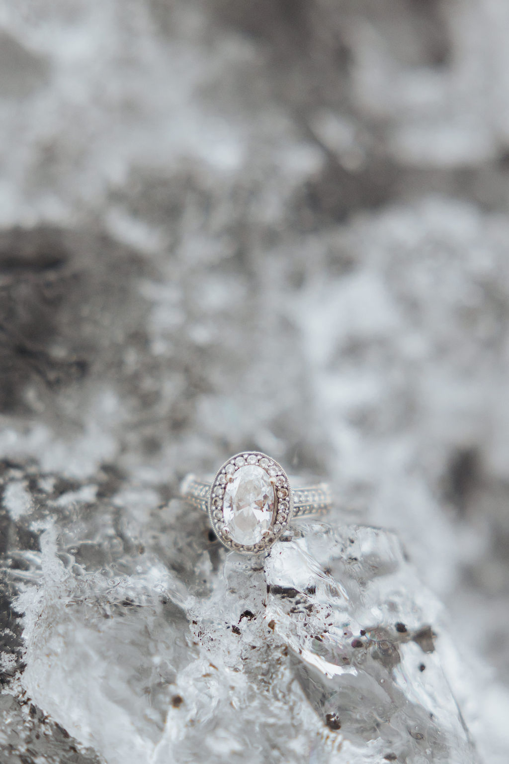 diamond wedding ring on ice rock