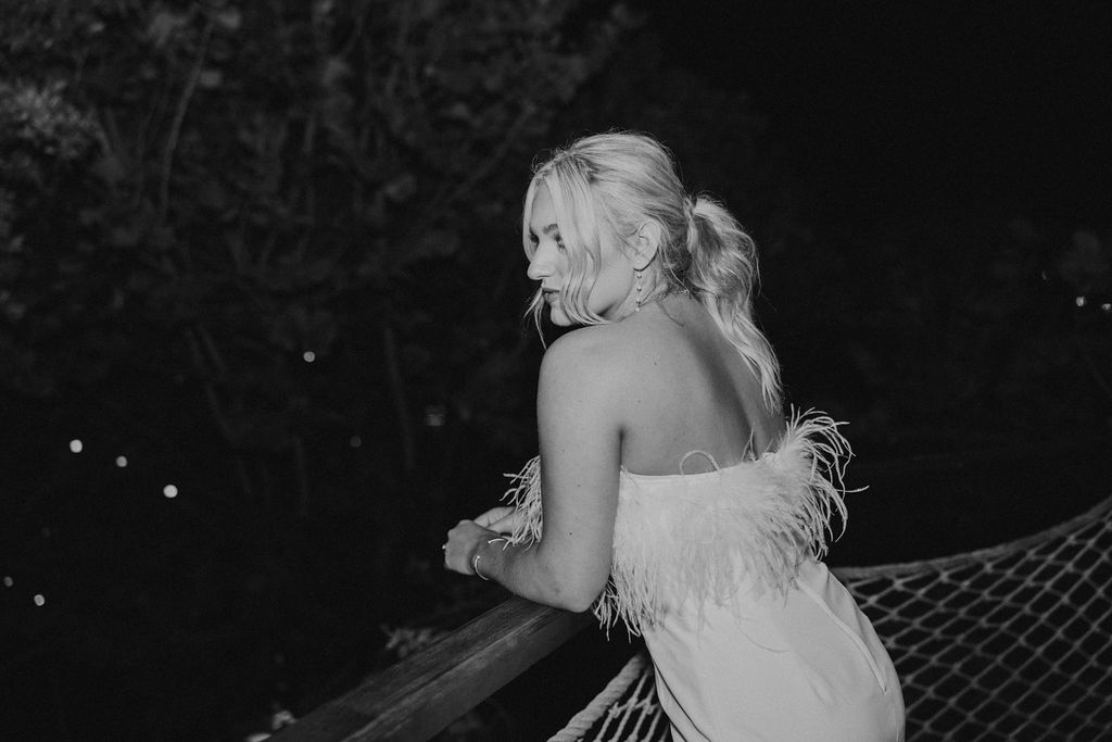 bride in white feather dress