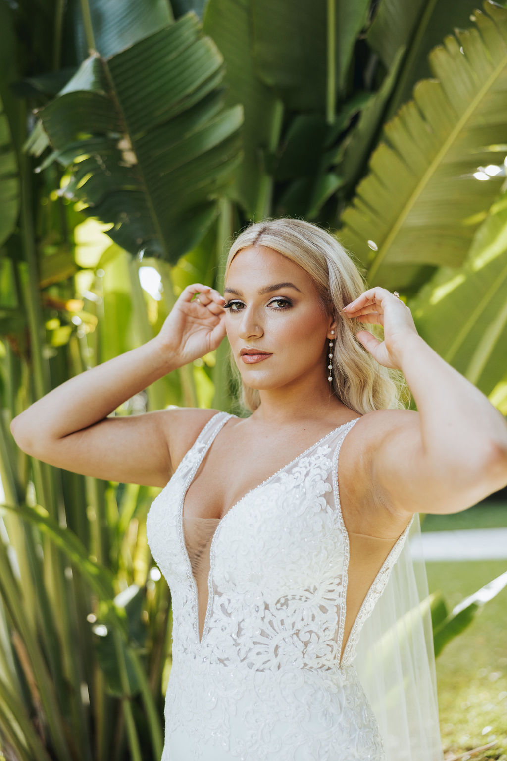 bridal portrait in front of palm tree