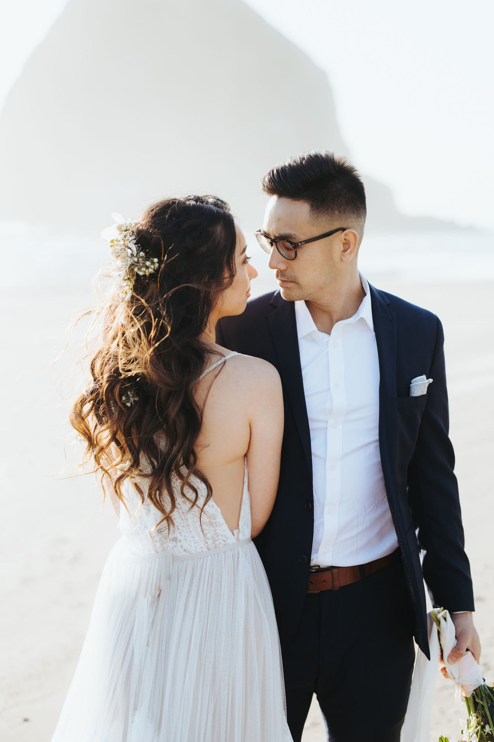 bride and groom portrait on beach