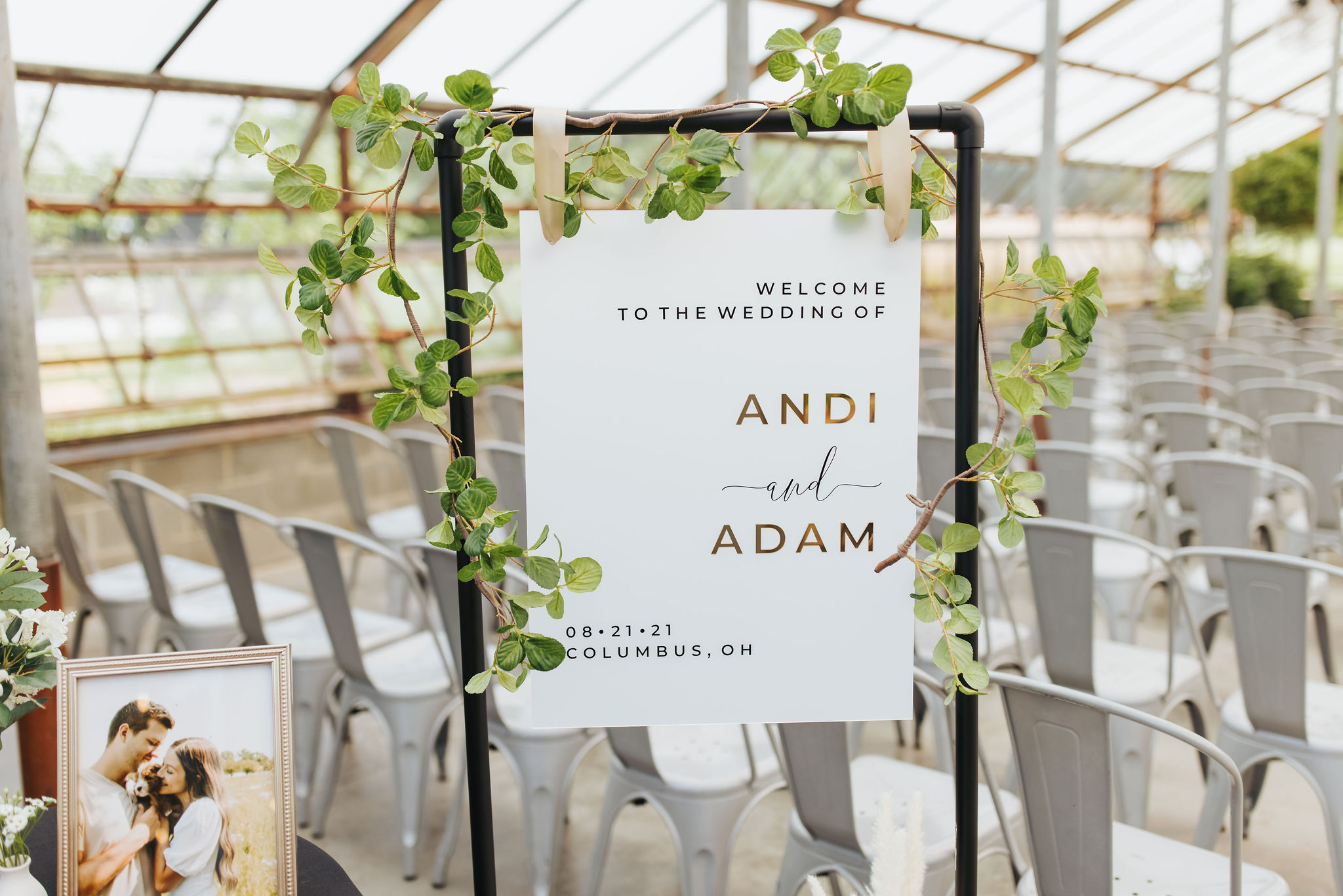 wedding welcome sign in greenhouse venue