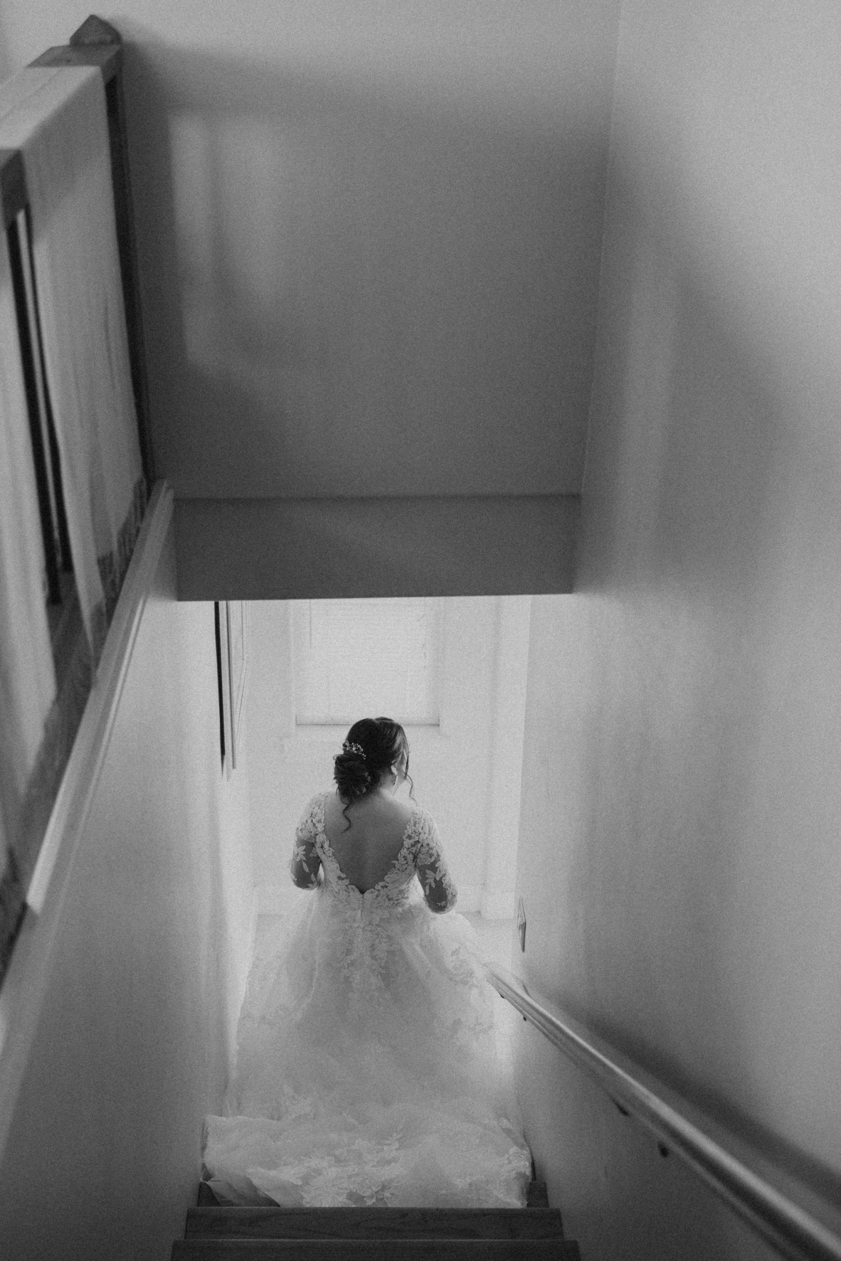 bride walking down the stairs before wedding ceremony in temecula california
