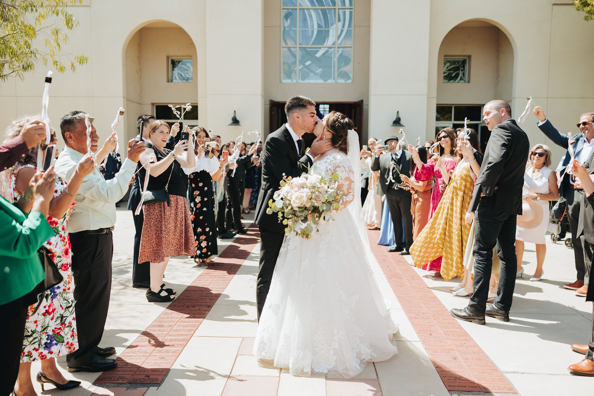 bride and groom exiting church after wedding ceremony in temecula california