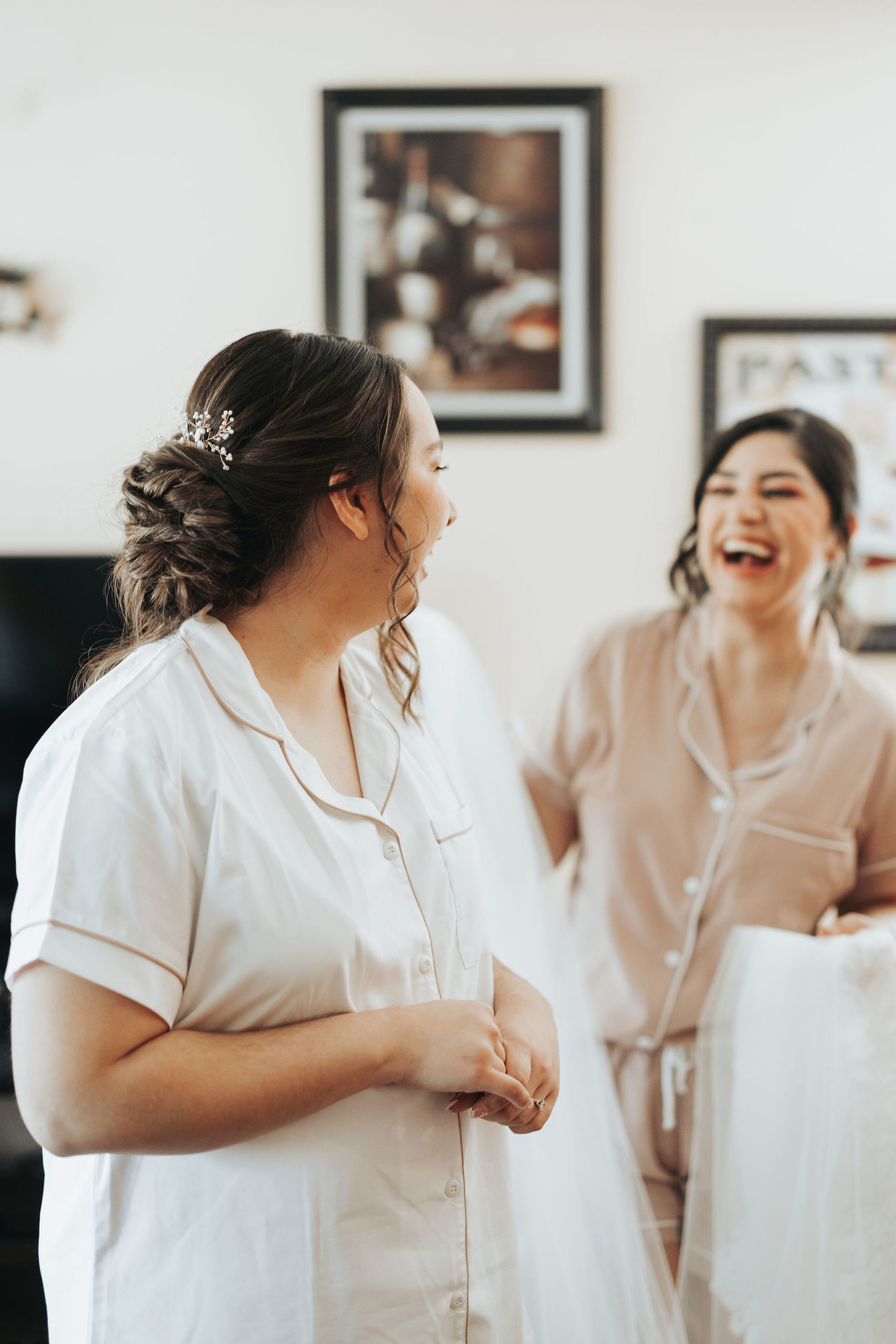 bride getting ready with bridesmaids before wedding