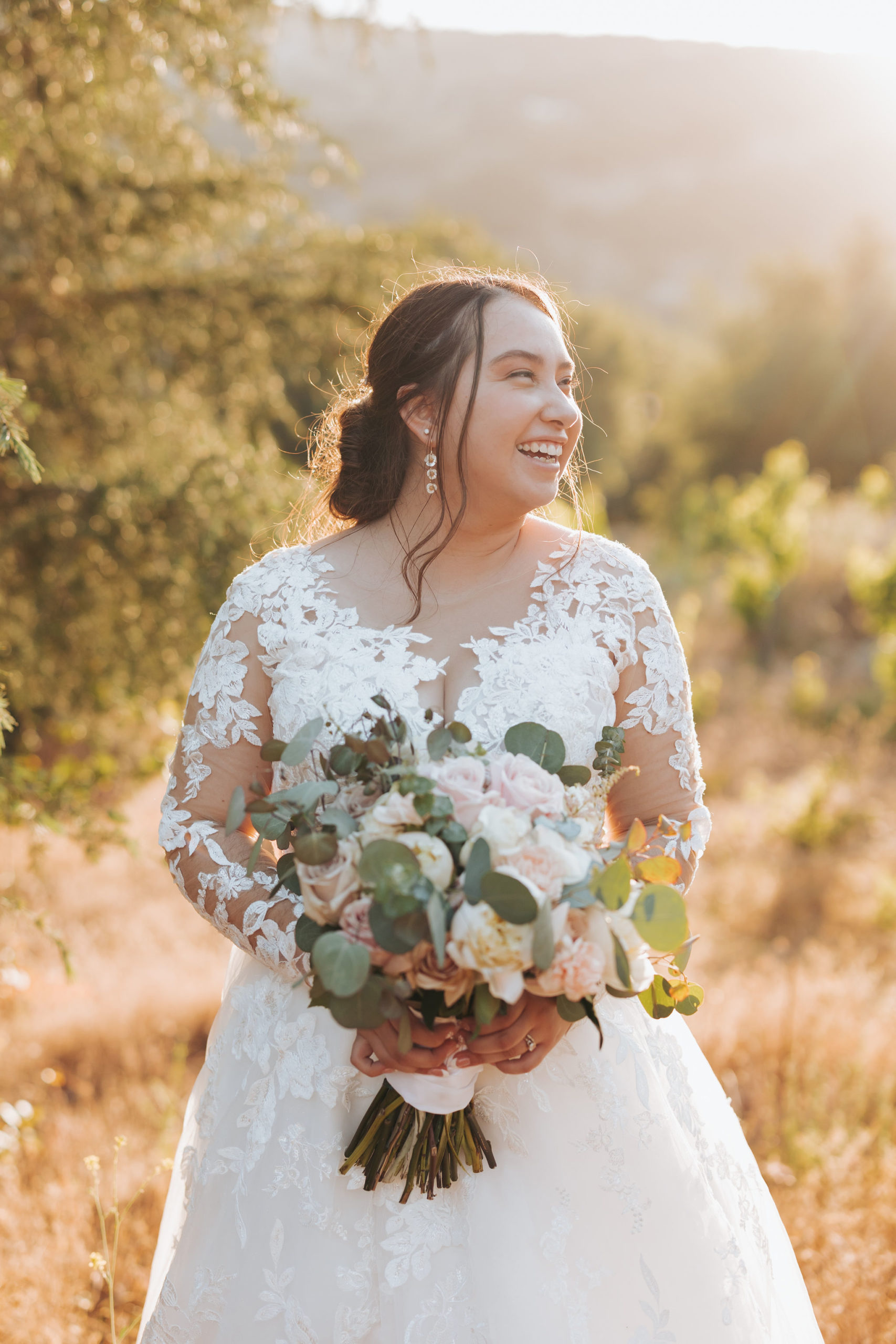 bride posing in front of Temecula california vineyard