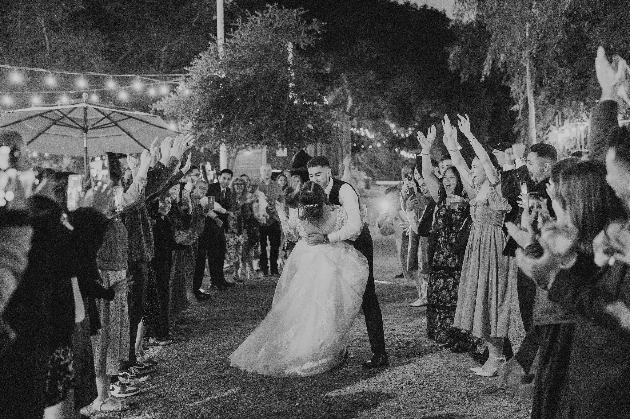 bride and groom grand exit at whispering oaks terrace in Temecula 