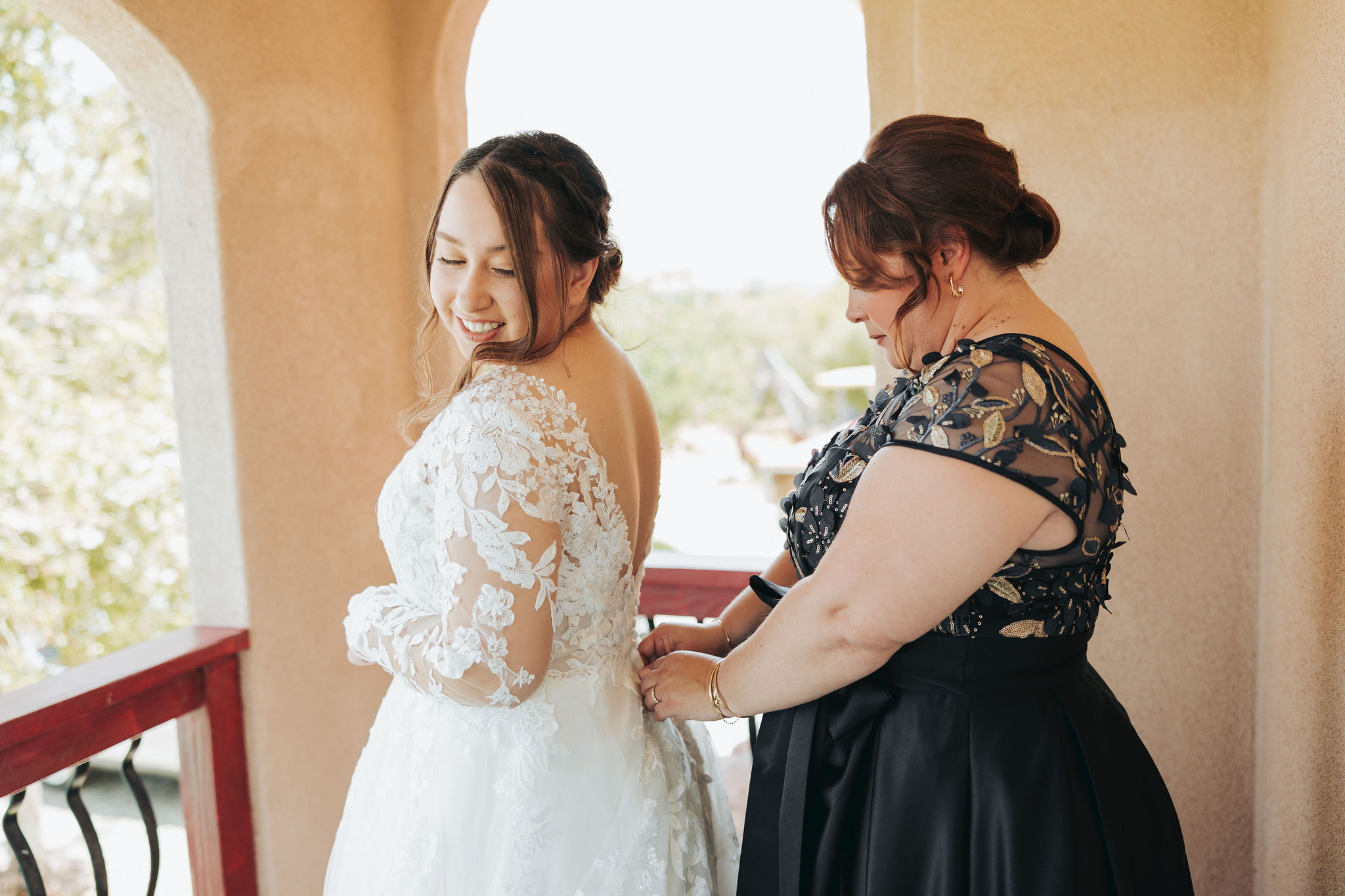 bride getting ready with her mother before wedding ceremony in temecula california