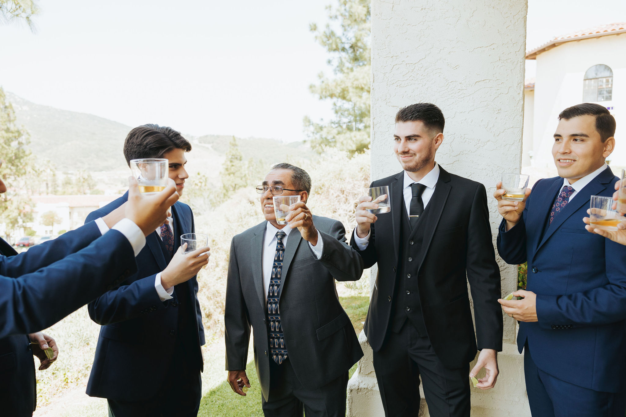 groom and groomsmen toasting in Temecula 