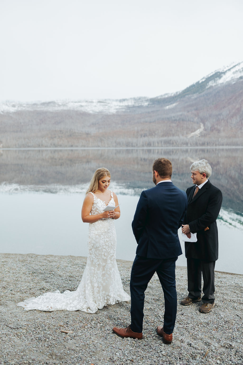 glacier national park elopement ceremony with bride and groom